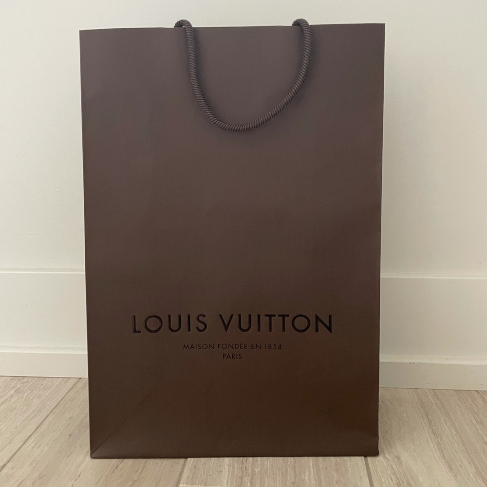 Louis Vuitton shopping bag, 14” x 8.75” x 4.75”